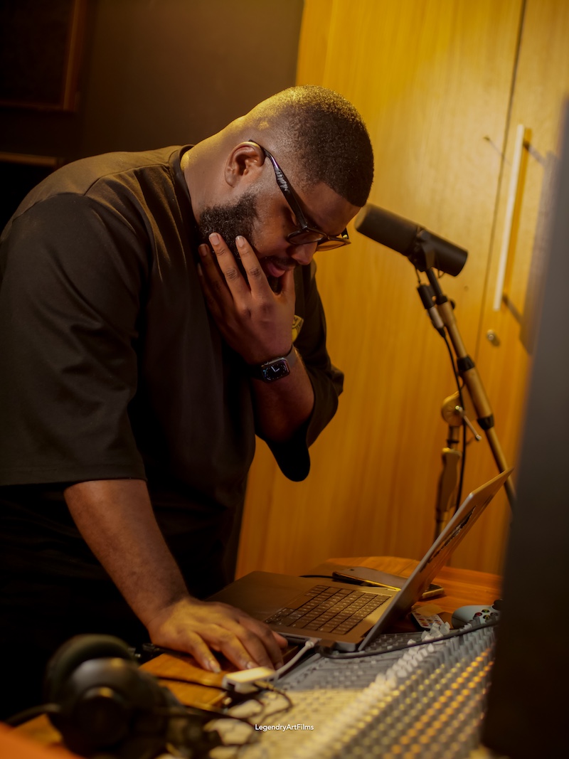 Kevin Eze, also known as Xclusive Pikin, working in the SounDisruptr studio